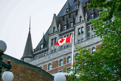 Low angle view of flag against sky