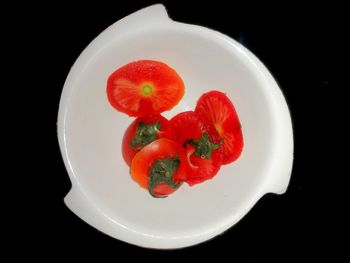 High angle view of cherries in plate