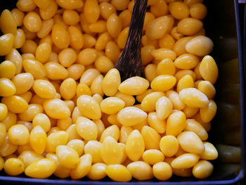 Ginkgo seeds in black bowl