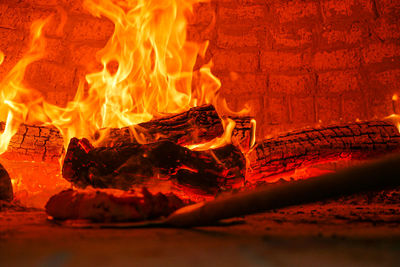 Close-up of fire burning in wood