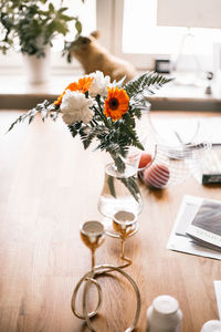 High angle  view of flower vase on dinning table at home