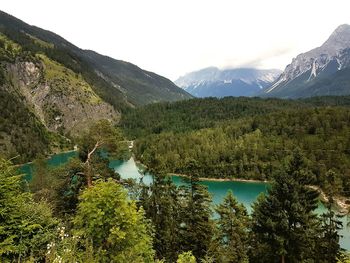 Scenic view of lake with mountains in background