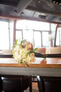 Close-up of flower vase on table