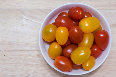 High angle view of fruits in bowl on table