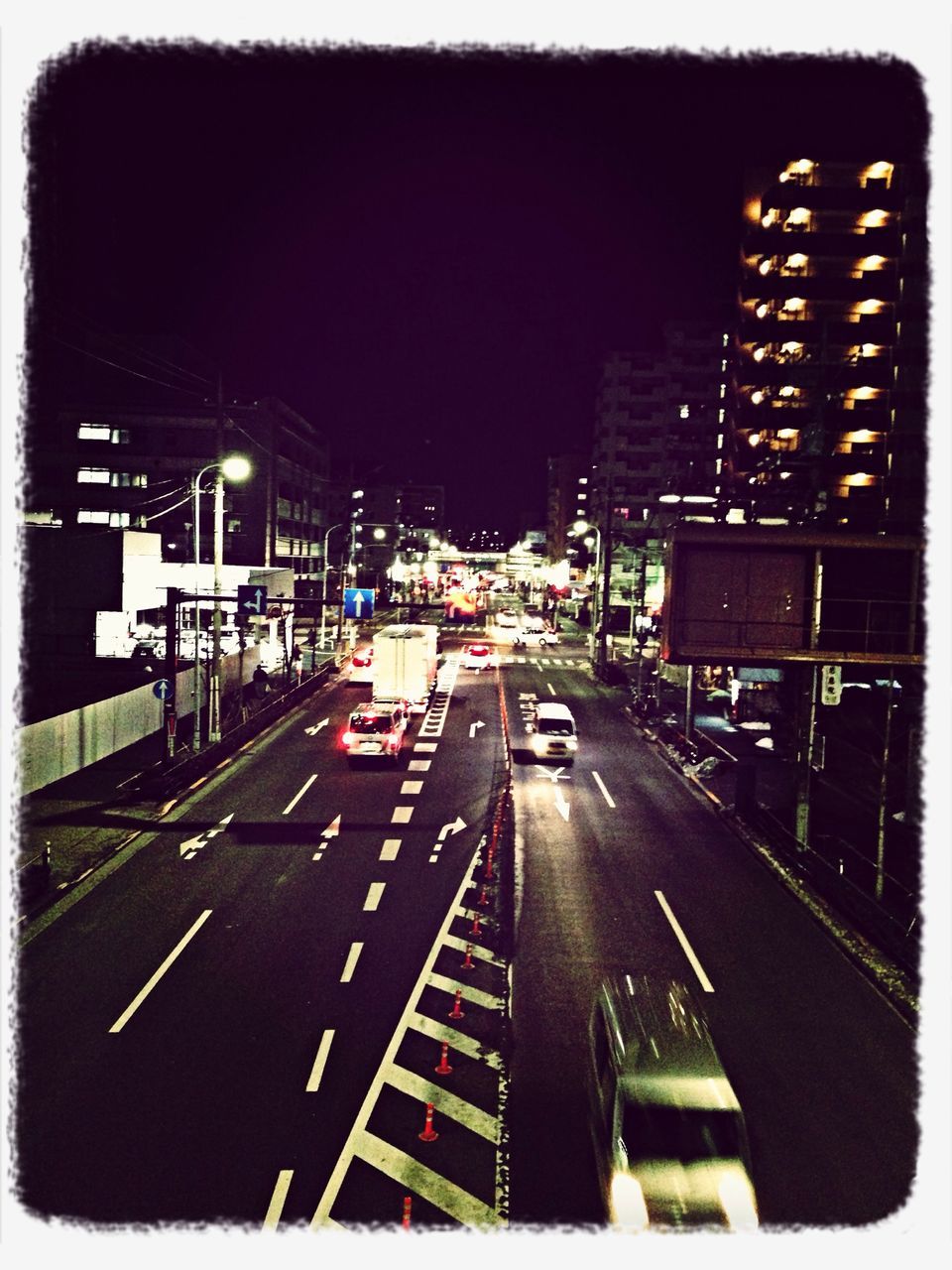 transfer print, transportation, building exterior, city, architecture, built structure, auto post production filter, car, street, road, road marking, land vehicle, mode of transport, illuminated, night, high angle view, city street, city life, the way forward, traffic