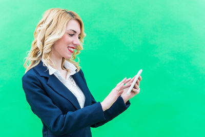 Young woman using mobile phone