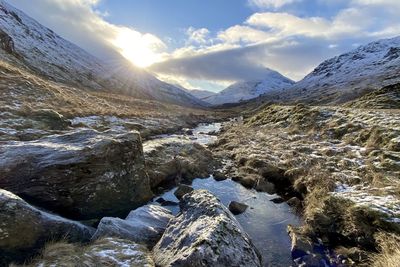 Scenic view of snowcapped mountains against sky