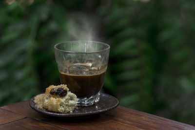 Close-up of coffee cup on table