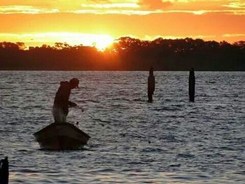 Scenic view of sea at sunset