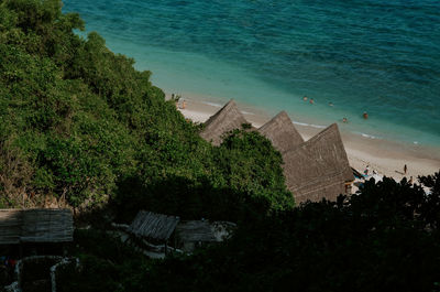 High angle view of buildings by sea