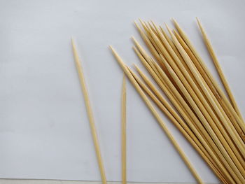 High angle view of vegetables on table against white background