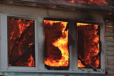 Low angle view of house in fire