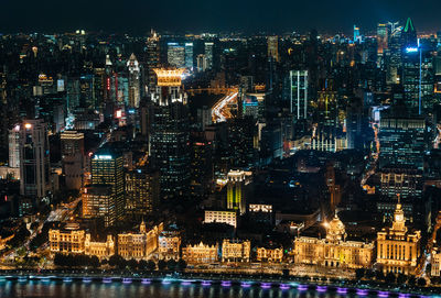 Illuminated buildings in city at night