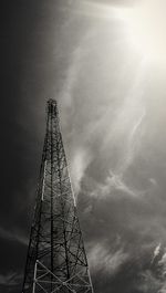 Low angle view of building against cloudy sky