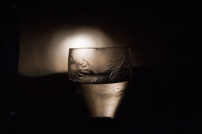 Close-up of lamp against black background