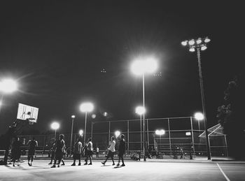 People at basketball playground