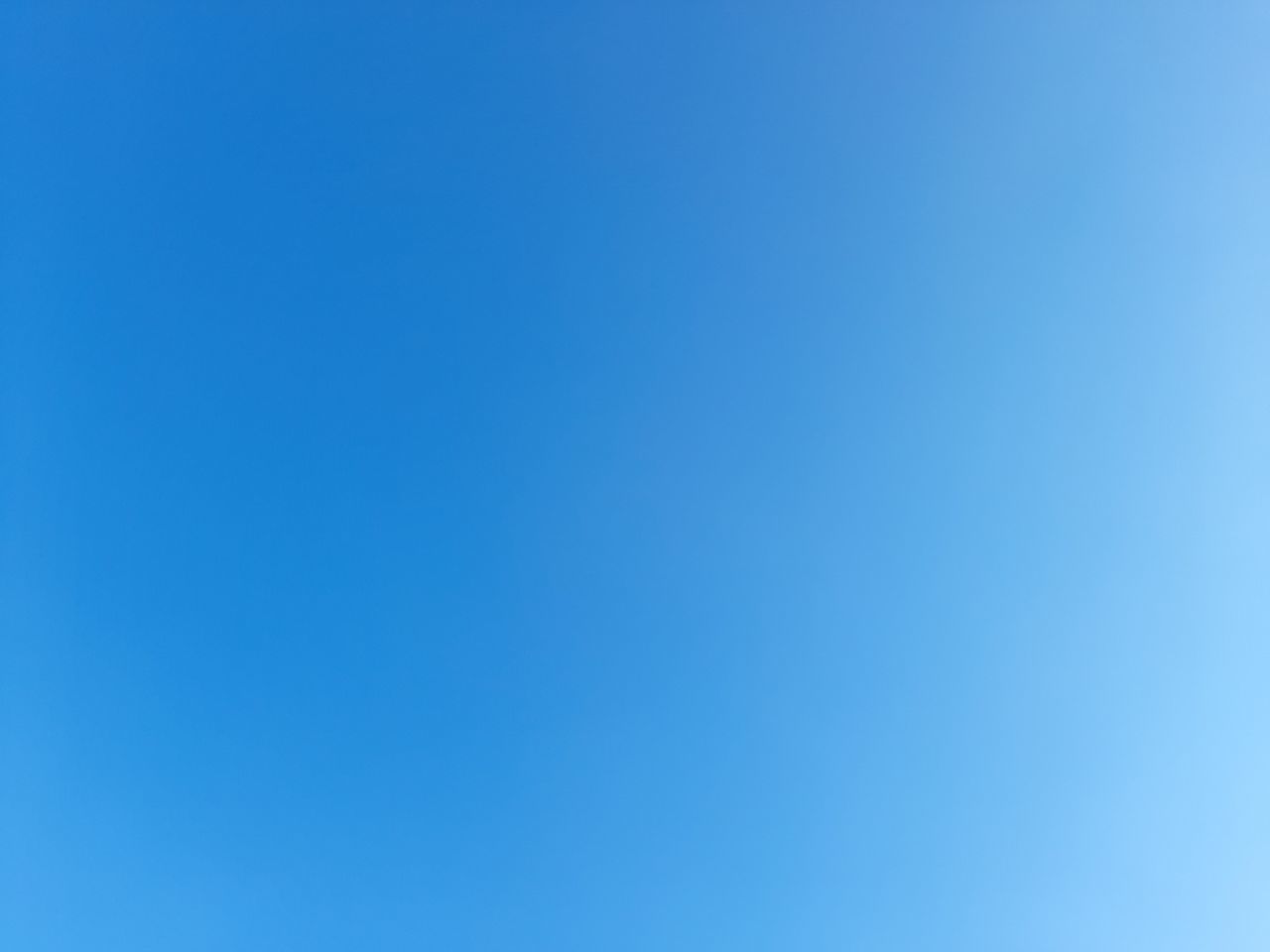 LOW ANGLE VIEW OF BLUE SKY AND CLEAR BACKGROUND