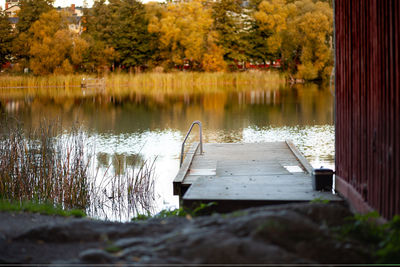 Scenic view of lake by trees during autumn