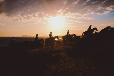 People riding horses