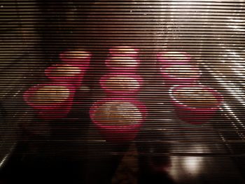 Close-up view of red blinds