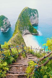 High angle view of rocks by sea