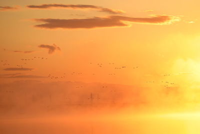 Scenic view of dramatic sky during sunset