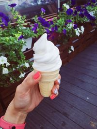 Midsection of person holding ice cream