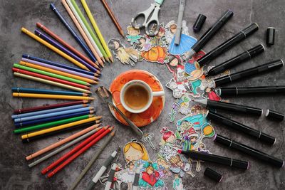 High angle view of multi colored pencils on table