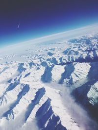 Aerial view of snow covered landscape