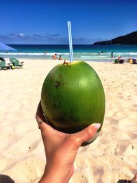 Scenic view of beach against blue sky