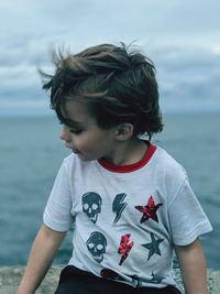 Close-up of boy looking away