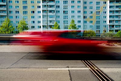 Blurred motion of vehicles on road in city