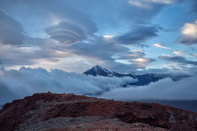 Scenic view of snowcapped mountains against sky