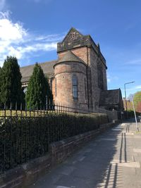 Exterior of historic building against sky