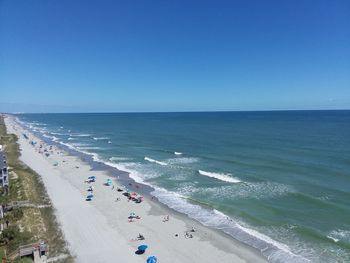 High angle view of beach against clear blue sky