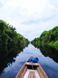 Scenic view of river and sky from boat