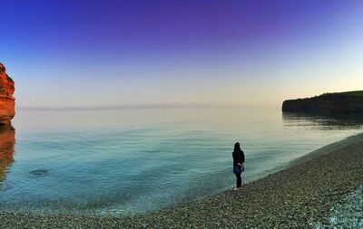 People standing on beach