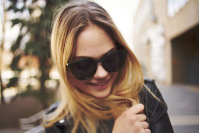 Young woman wearing sunglasses outdoors