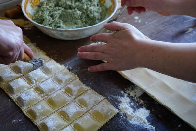 High angle view of people preparing food