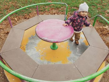 High angle view of girl playing in playground