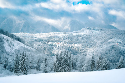 Scenic view of snowcapped mountains in a winter day