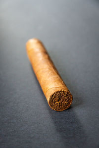 Close-up of cigarette on table