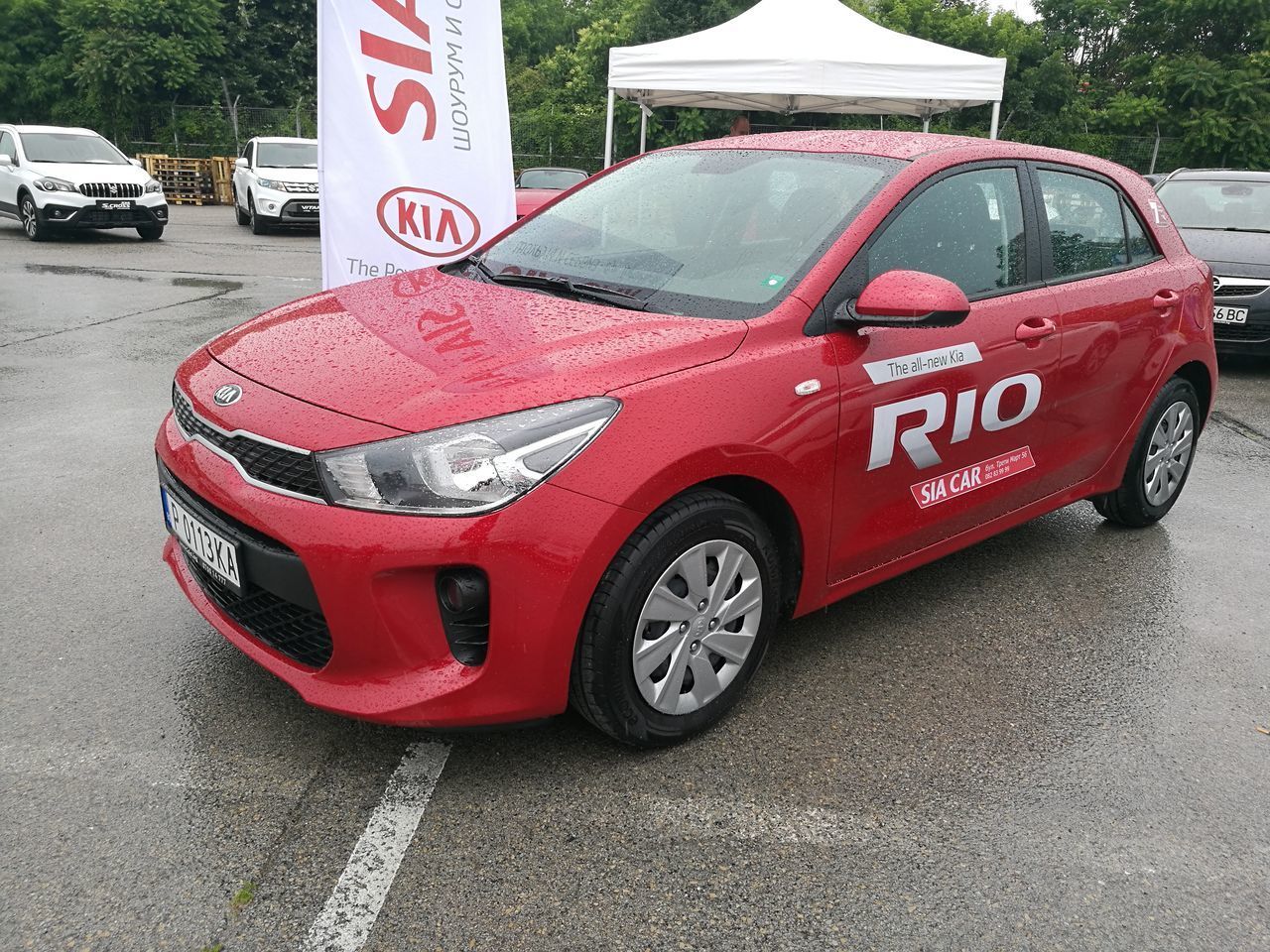 RED CAR ON ROAD