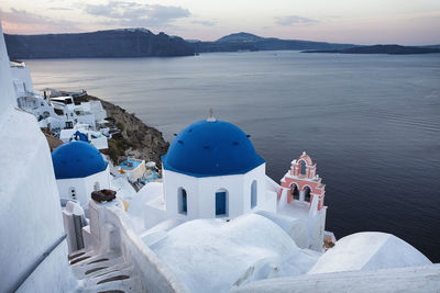 Panoramic view of building and mountains against sky