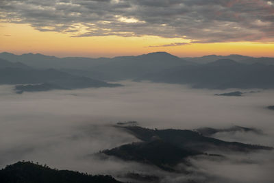 Scenic view of mountains against sky during sunset