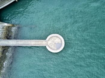 Aerial view of pier on turquoise sea
