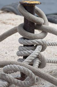 Close-up of rope tied on cleat