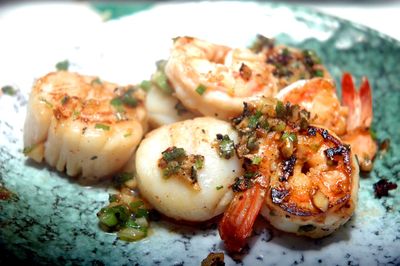 Close-up of assorted grilled seafood served in plate