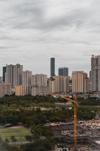 Modern buildings in city against sky