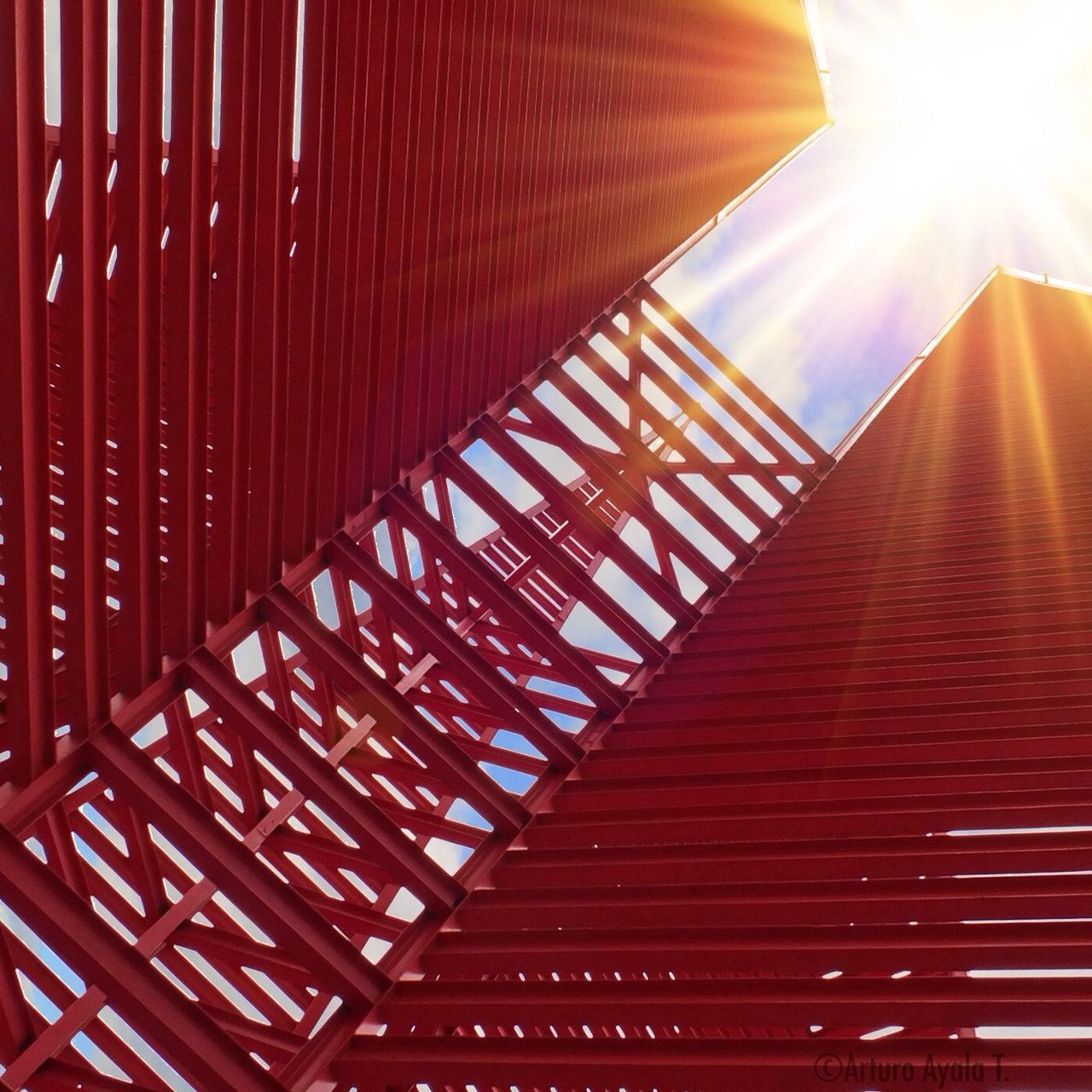 sun, sunbeam, sunlight, lens flare, low angle view, built structure, architecture, sunny, pattern, building exterior, bright, red, no people, sky, day, outdoors, sunset, steps, orange color, shadow